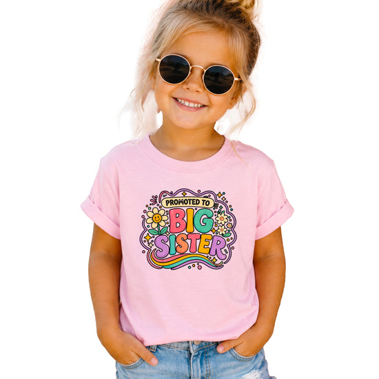 Promoted to Big Sister daisy rainbow girls tee in Pink by Olive Loves Apple (view 2)