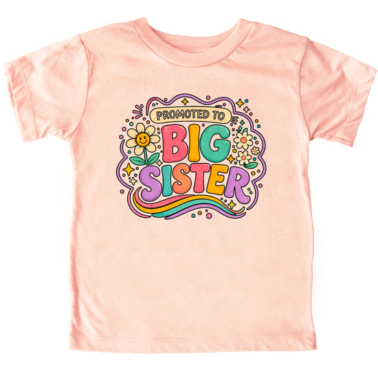 Promoted to Big Sister daisy rainbow girls tee in Peach by Olive Loves Apple (view 1)