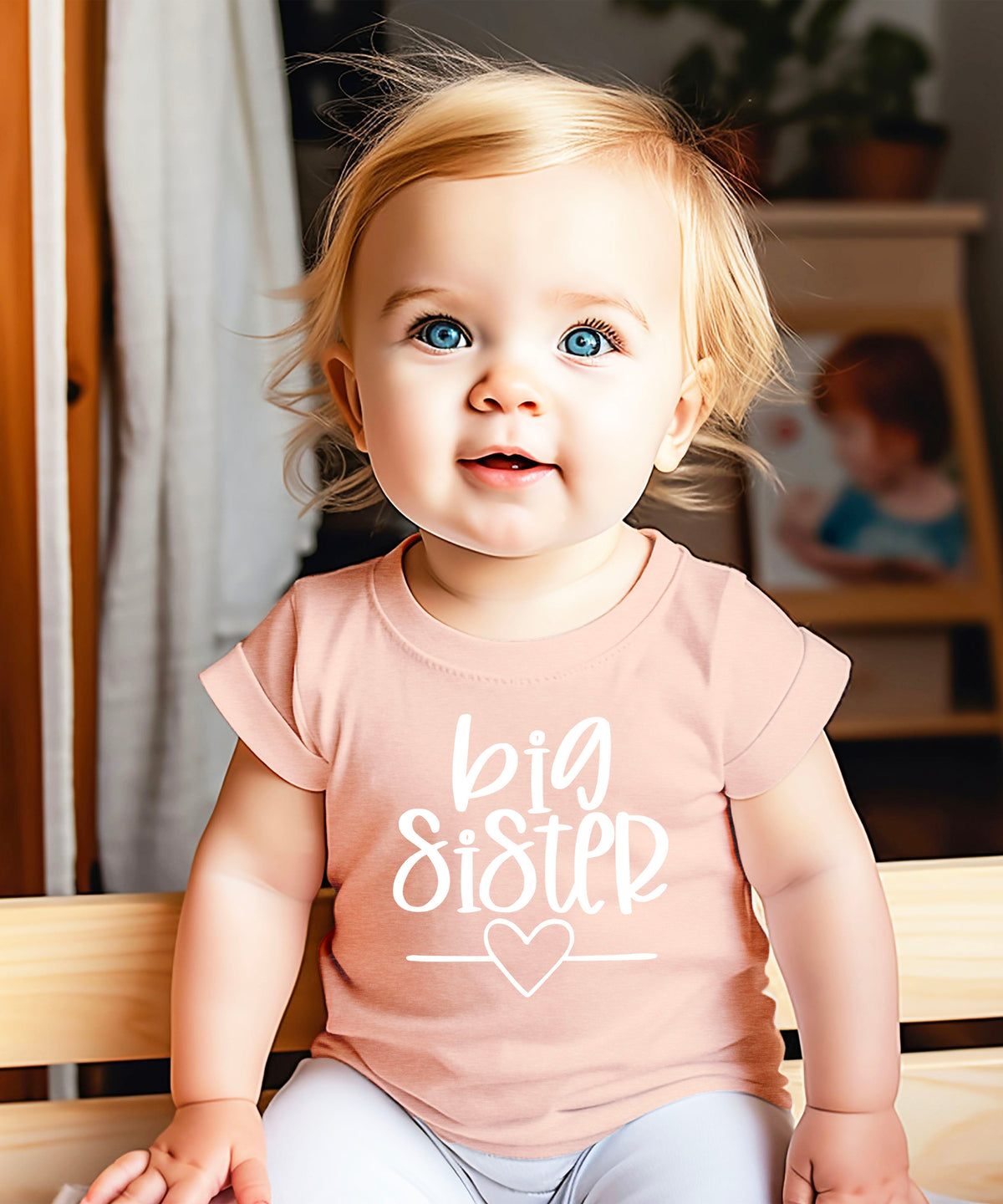 Big Sister heart sibling reveal t-shirt in white on peach, second view