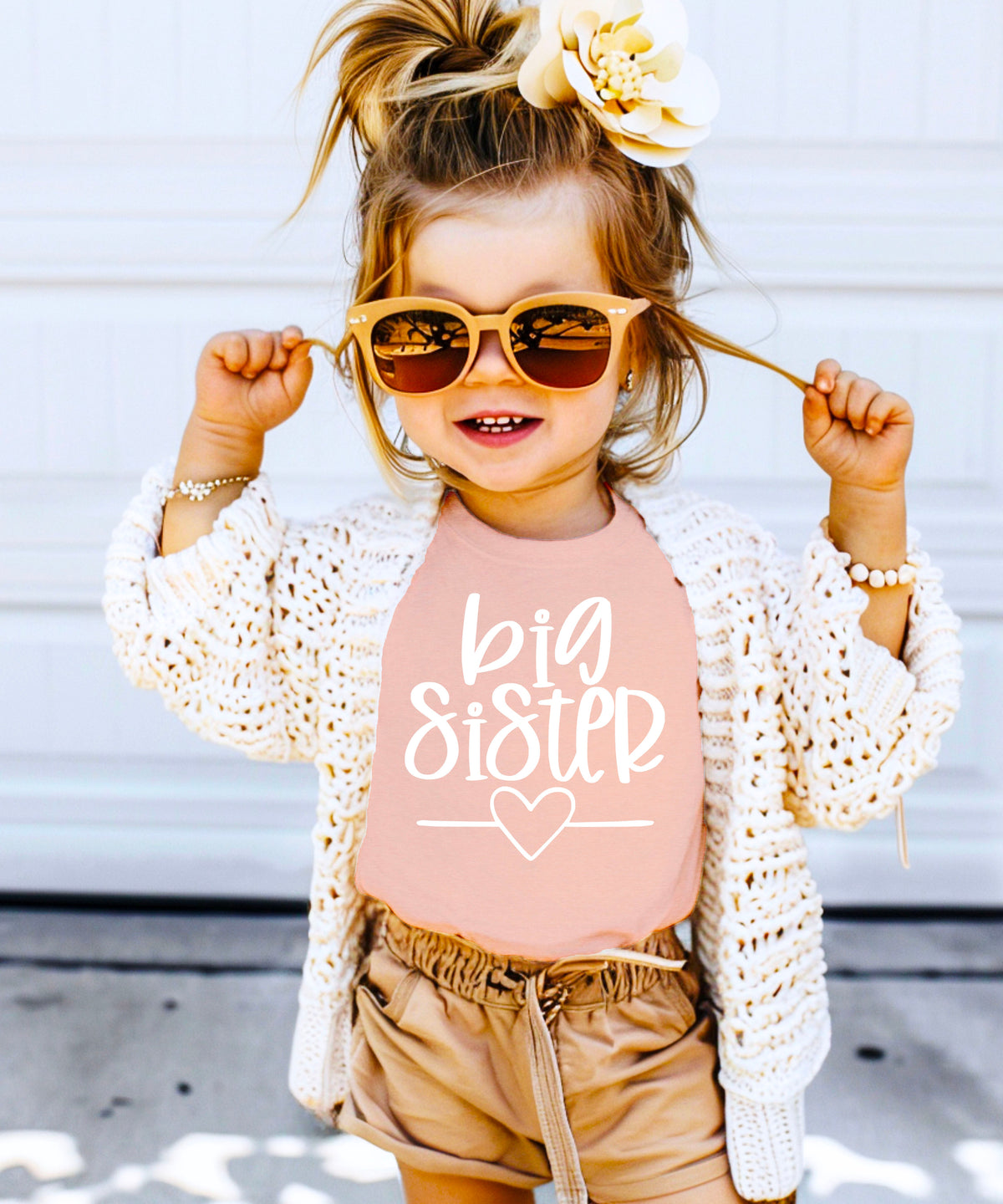 Big Sister heart sibling reveal t-shirt in white on peach, third view