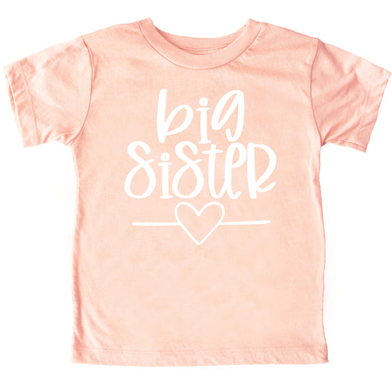 Big Sister heart sibling reveal t-shirt in white on peach, fourth view