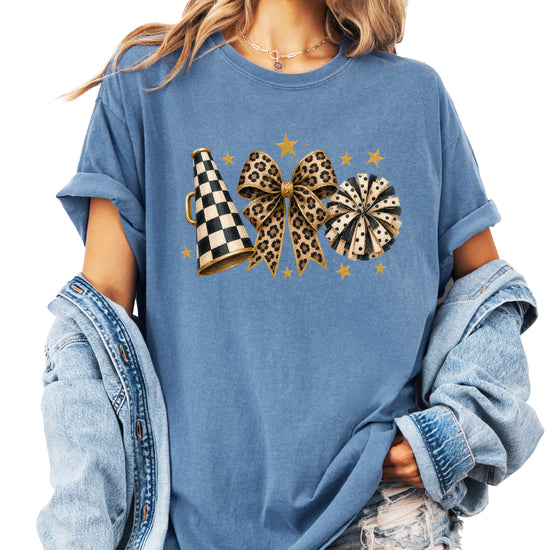 Blue Jean Comfort Colors 1717 cheer t-shirt with checkered megaphone, leopard print bow and polka dot pom pom graphic, front view