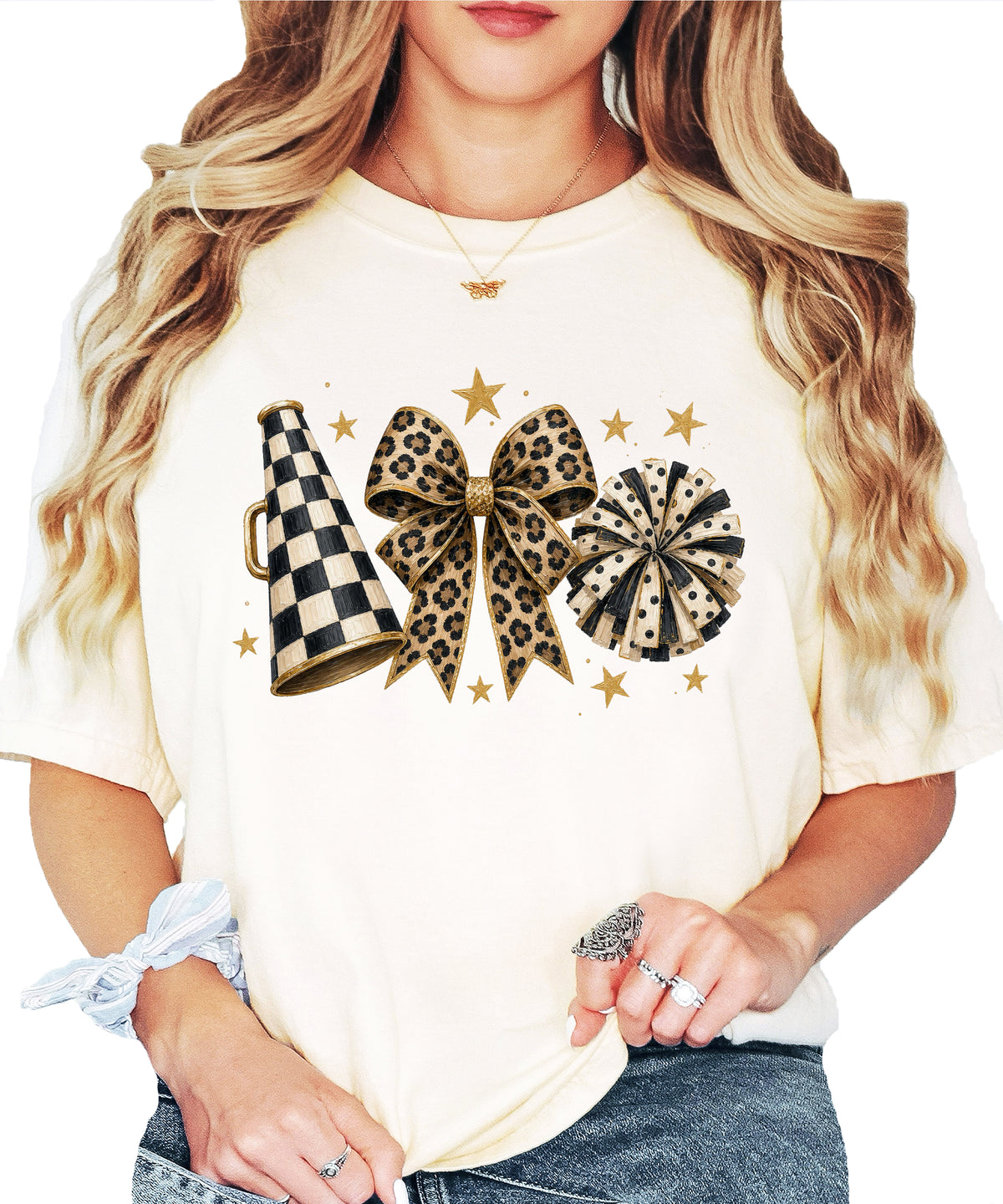 Ivory Comfort Colors 1717 cheer t-shirt with checkered megaphone, leopard print bow and polka dot pom pom graphic, front view
