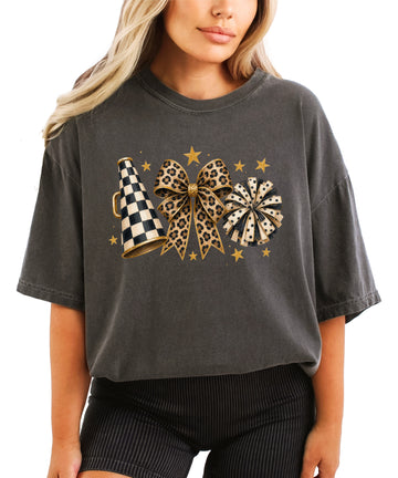 Pepper Comfort Colors 1717 cheer t-shirt with checkered megaphone, leopard print bow and polka dot pom pom graphic, front view