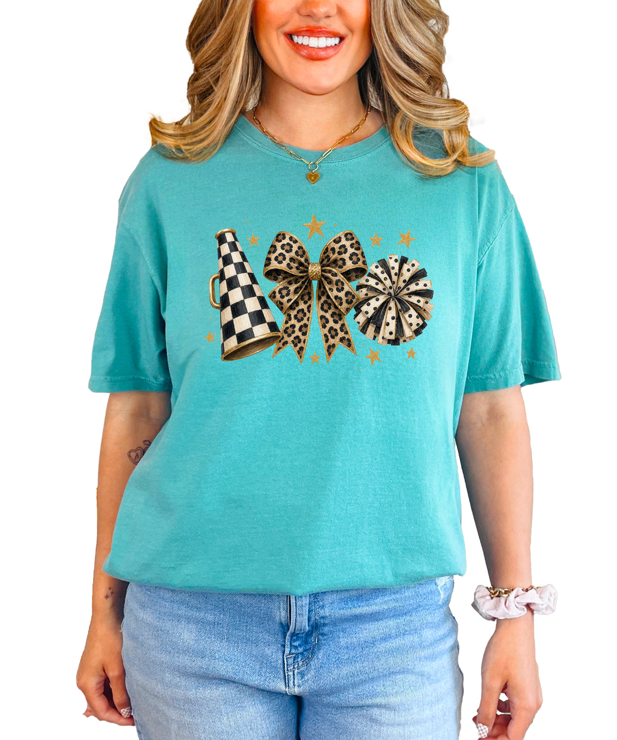 Seafoam Comfort Colors 1717 cheer t-shirt with checkered megaphone, leopard print bow and polka dot pom pom graphic, front view