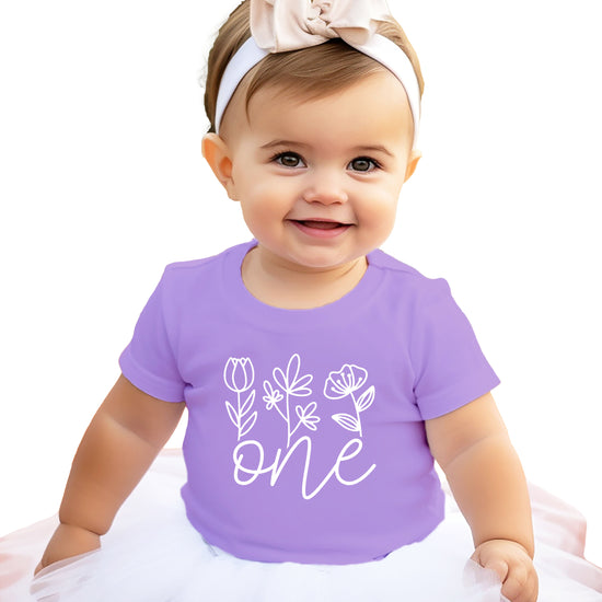 Floral One first birthday shirt for baby girls in purple, front view