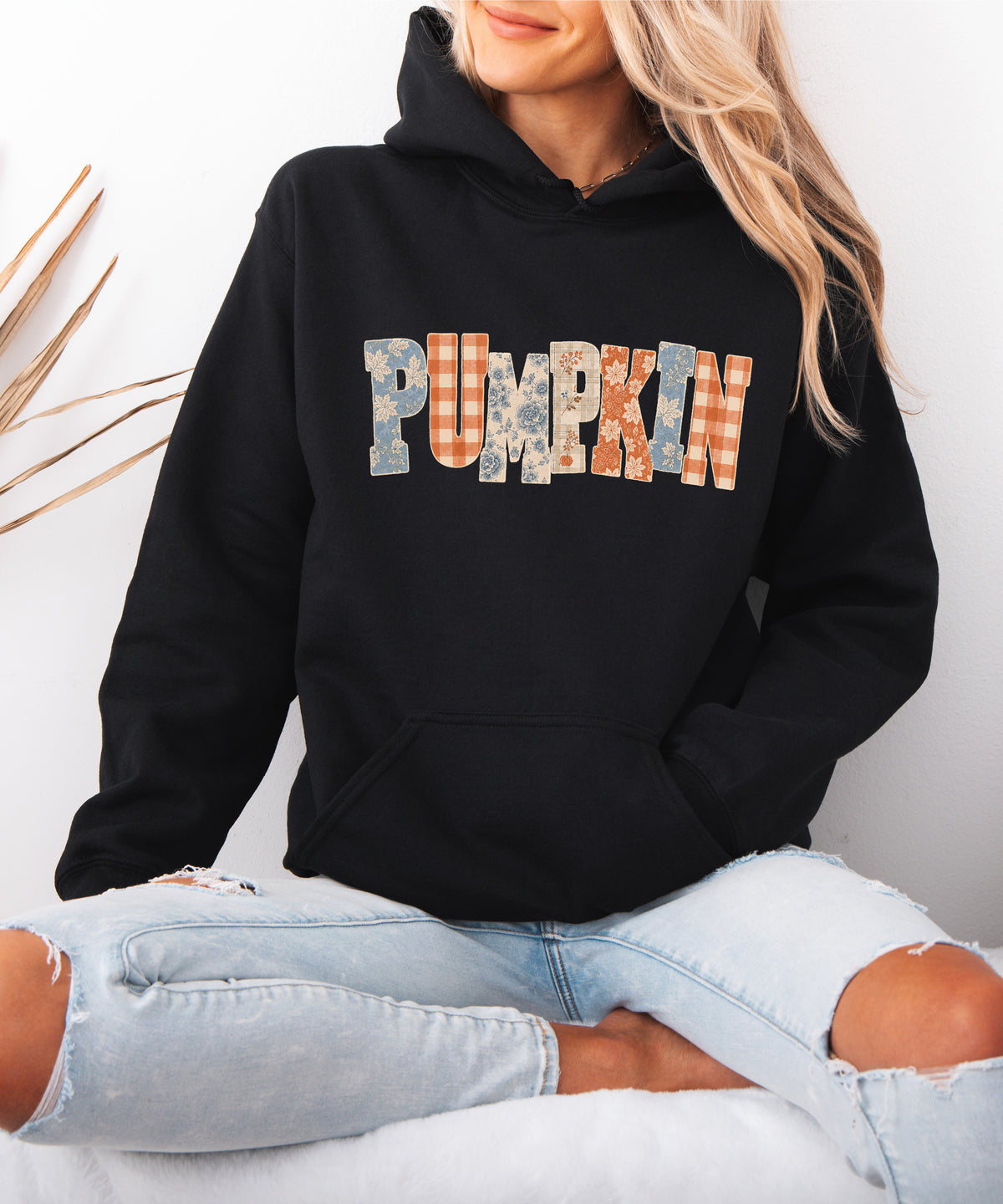 Black Pumpkin Patch fall hoodie for women and teen girls, lifestyle view