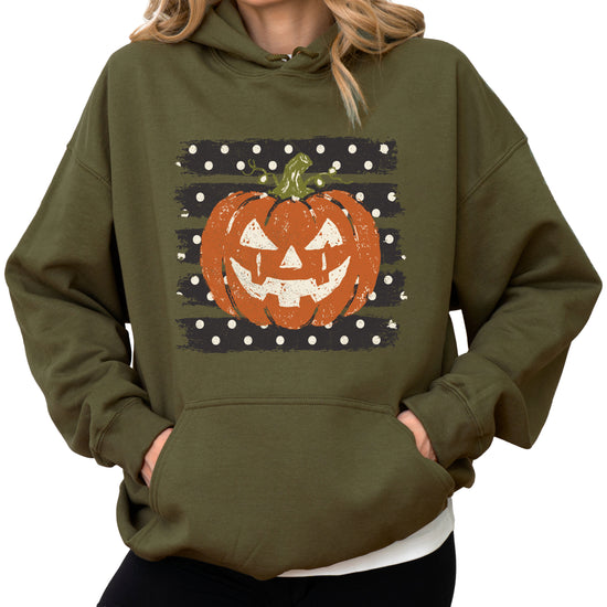 Army Green hoodie with retro polka dot jack o lantern pumpkin graphic, styled flat lay