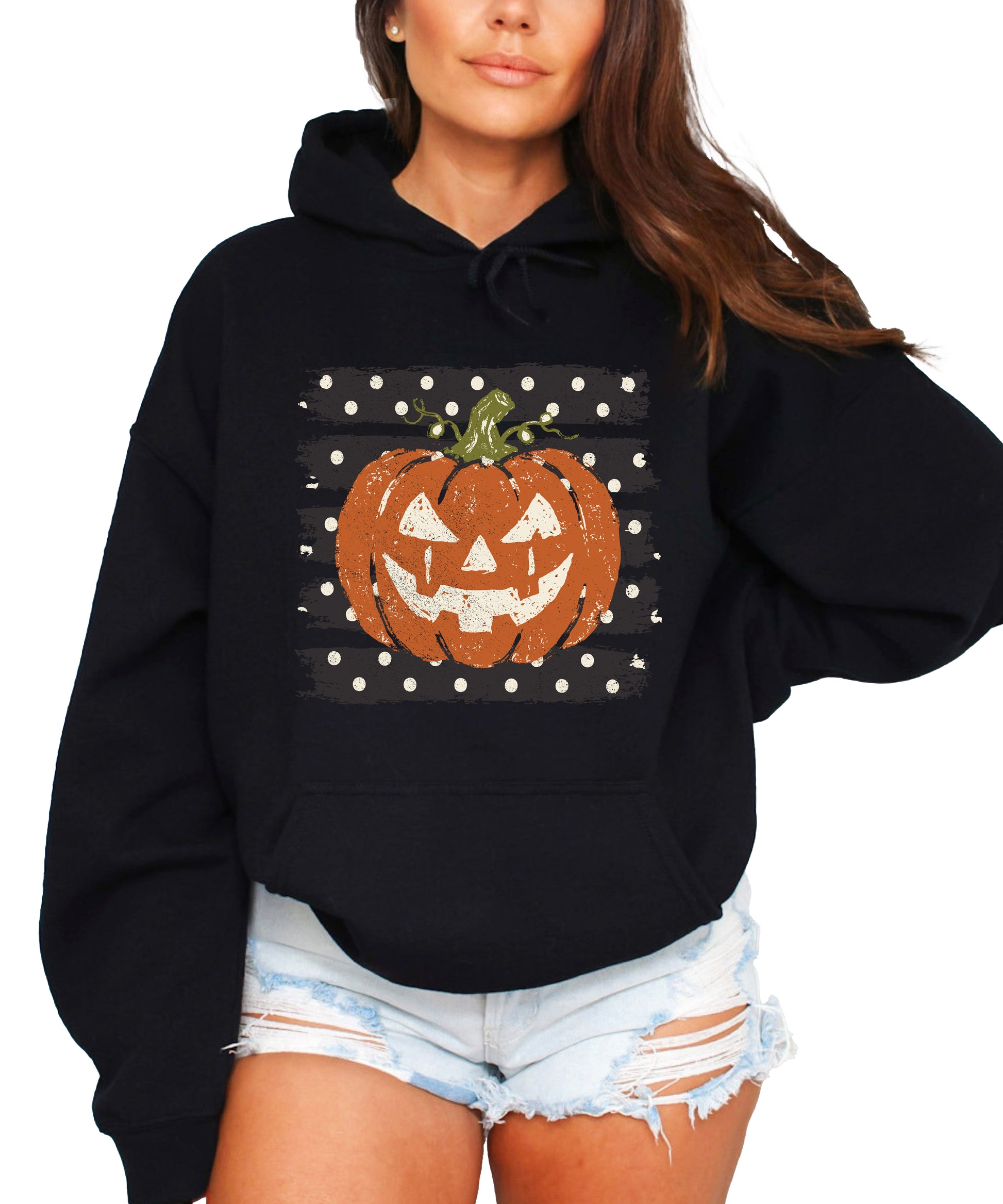 Black hoodie with retro polka dot jack o lantern pumpkin graphic, front view