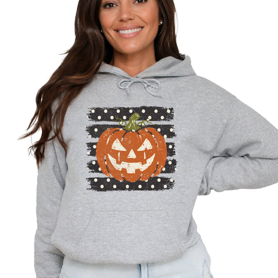 Gray hoodie with retro polka dot jack o lantern pumpkin graphic, front view