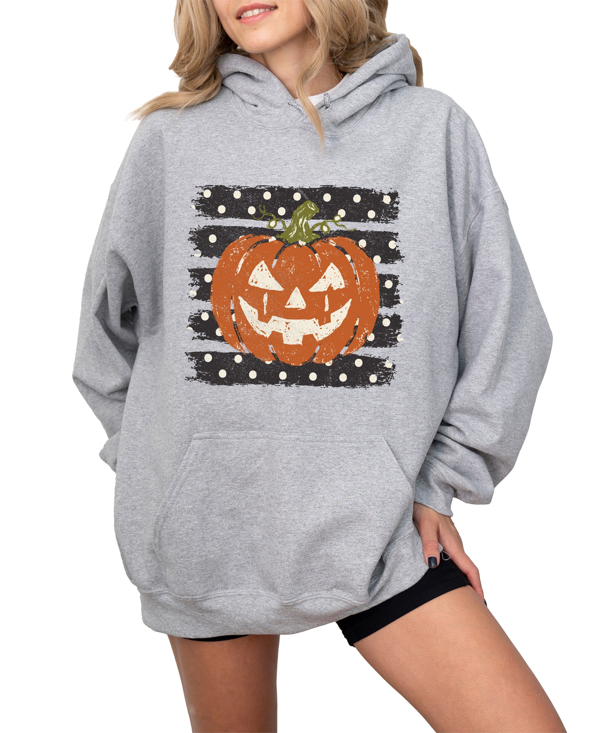 Gray hoodie with retro polka dot jack o lantern pumpkin graphic, detail shot