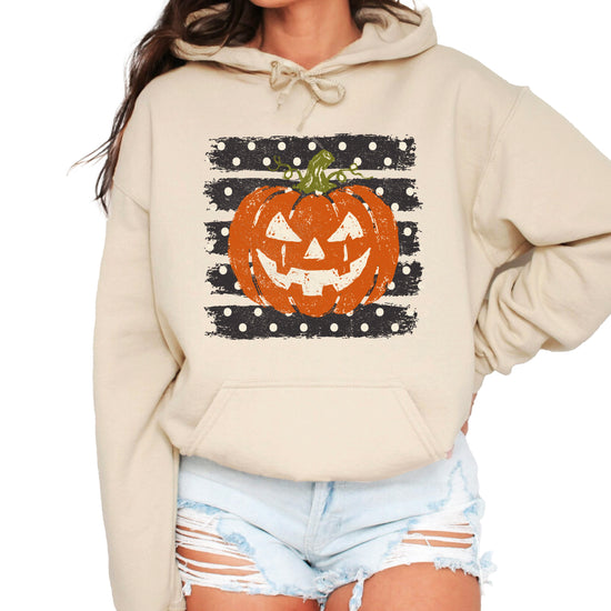 Sand hoodie with retro polka dot jack o lantern pumpkin graphic, front view