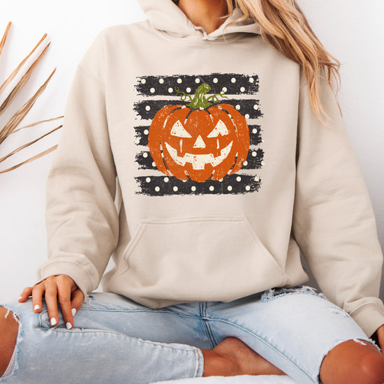 Sand hoodie with retro polka dot jack o lantern pumpkin graphic, detail shot