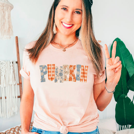 Pumpkin patch fall graphic tee for women and teen girls in Peach, model wearing the tee