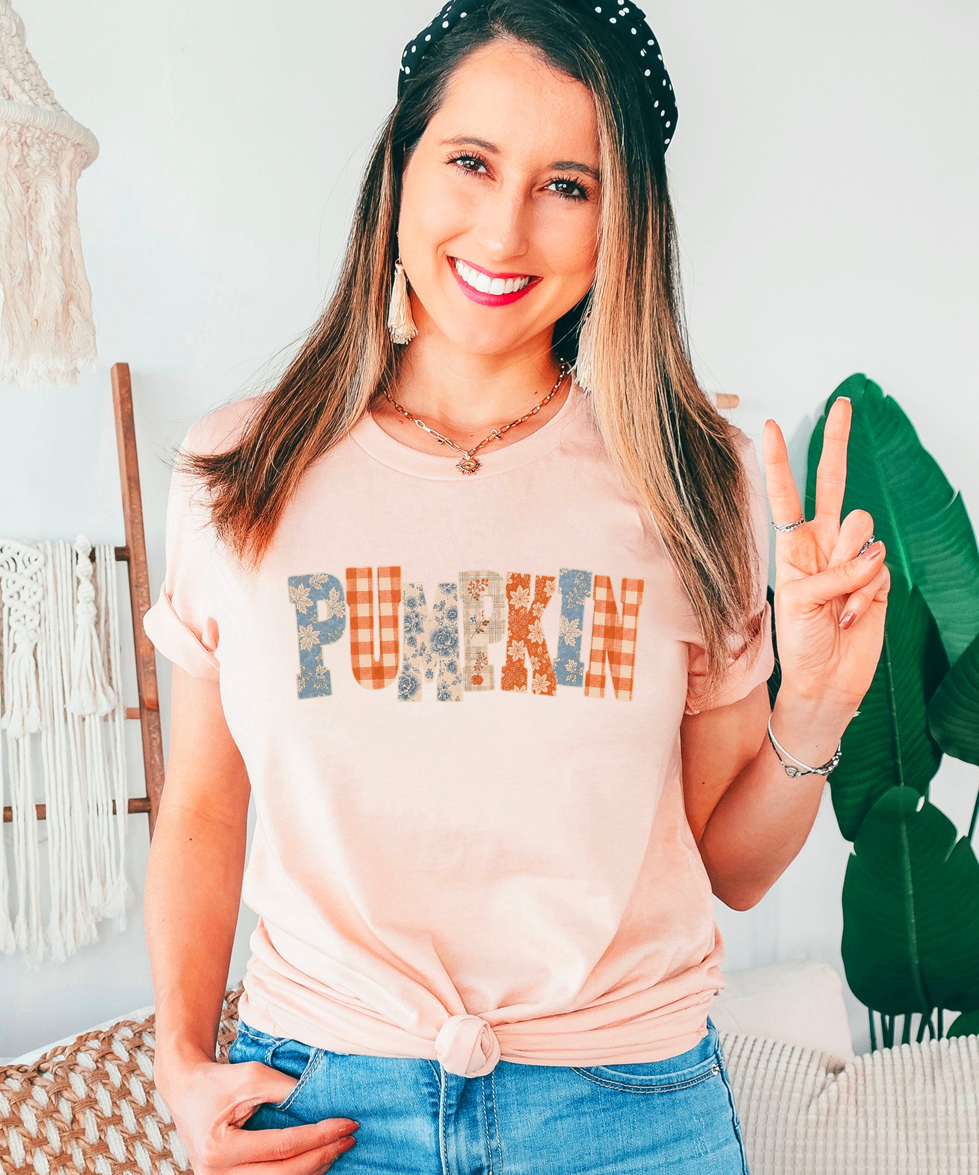 Pumpkin patch fall graphic tee for women and teen girls in Peach, model wearing the tee