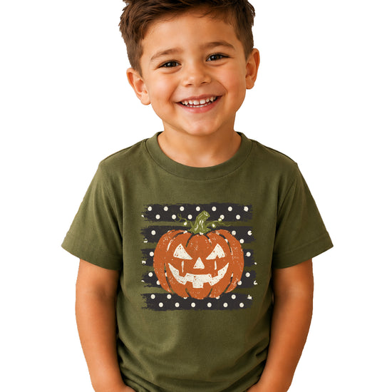 Retro jack-o-lantern pumpkin polka dot Halloween kids tee in Military Green, lifestyle view