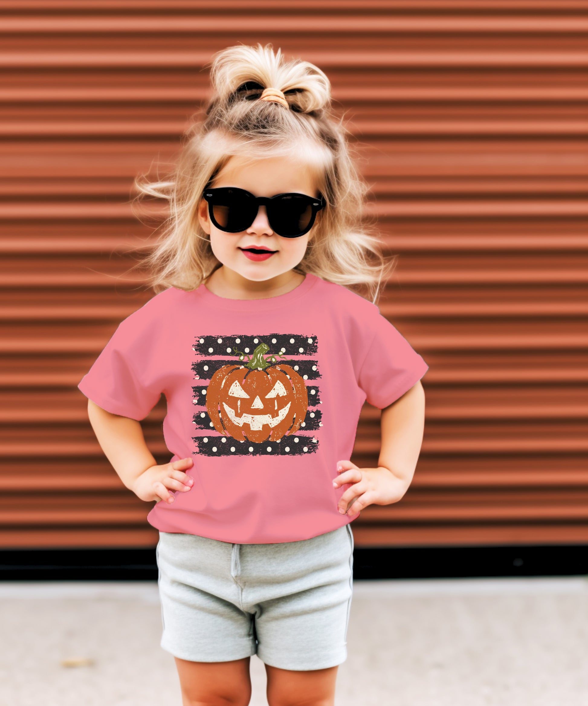 Retro jack-o-lantern pumpkin polka dot Halloween kids tee in Mauve, fit and back view