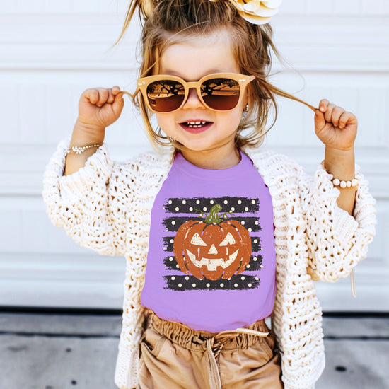 Retro jack-o-lantern pumpkin polka dot Halloween kids tee in Purple, fit and back view