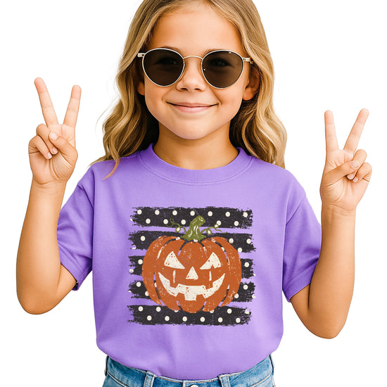Retro jack-o-lantern pumpkin polka dot Halloween kids tee in Purple, close-up print detail