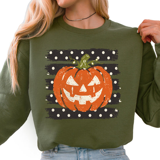 Jack-o-lantern pumpkin polka dot Halloween crewneck sweatshirt in Army Green, front view