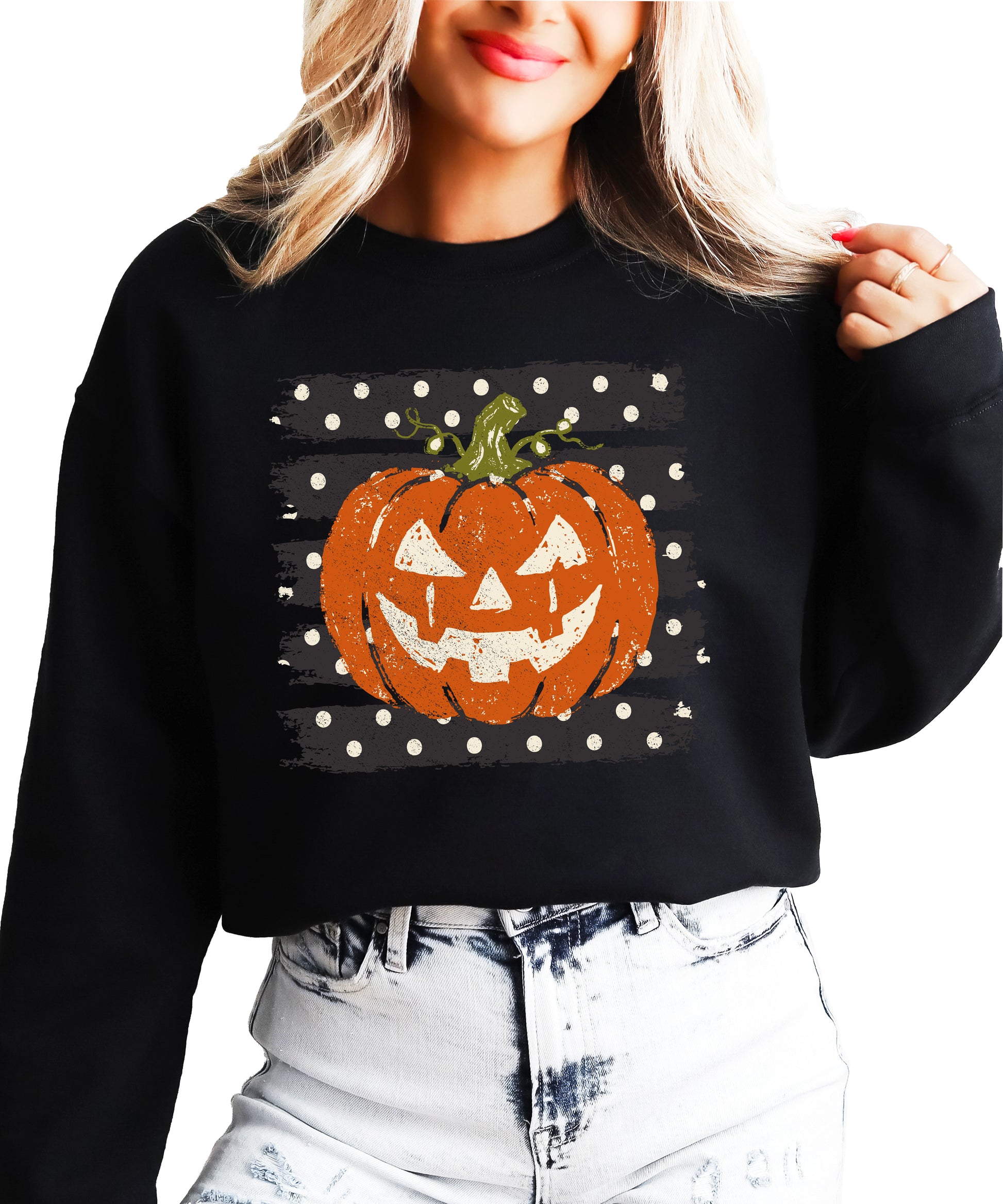 Jack-o-lantern pumpkin polka dot Halloween crewneck sweatshirt in Black, lifestyle view