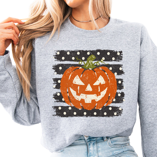 Jack-o-lantern pumpkin polka dot Halloween crewneck sweatshirt in Gray, front view
