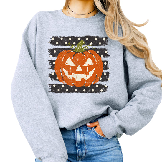 Jack-o-lantern pumpkin polka dot Halloween crewneck sweatshirt in Gray, lifestyle view