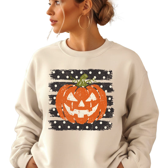 Jack-o-lantern pumpkin polka dot Halloween crewneck sweatshirt in Sand, front view