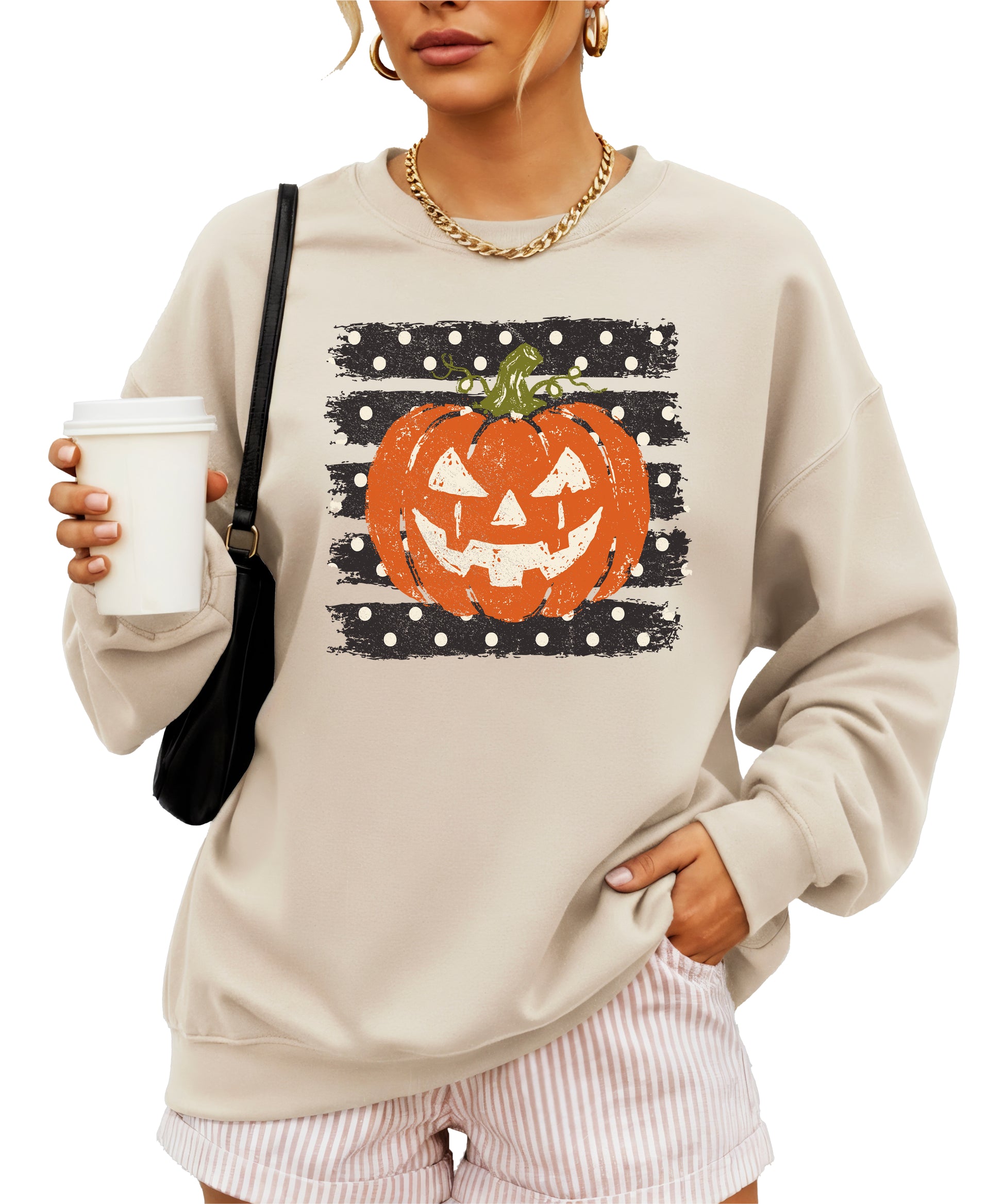 Jack-o-lantern pumpkin polka dot Halloween crewneck sweatshirt in Sand, lifestyle view