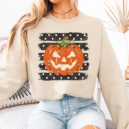 Jack-o-lantern pumpkin polka dot Halloween crewneck sweatshirt in Sand, flat lay view