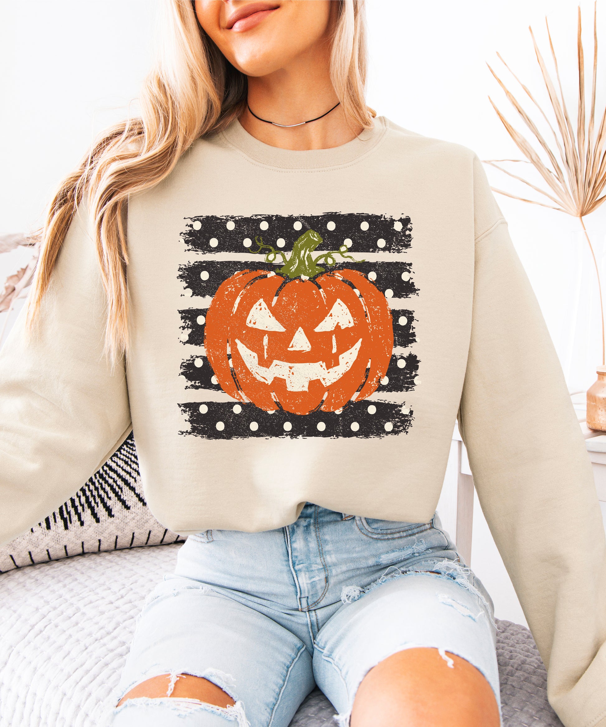 Jack-o-lantern pumpkin polka dot Halloween crewneck sweatshirt in Sand, flat lay view