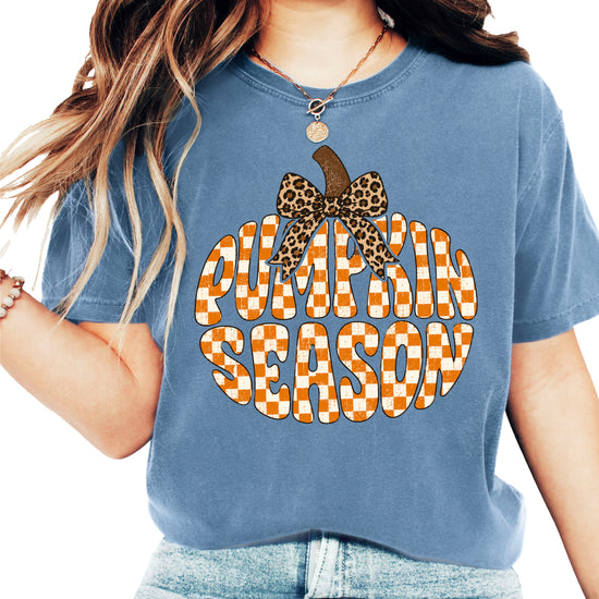 Pumpkin Season checkered pumpkin with leopard bow graphic tee in Blue Jean, Comfort Colors 1717 womens fall t-shirt, front view