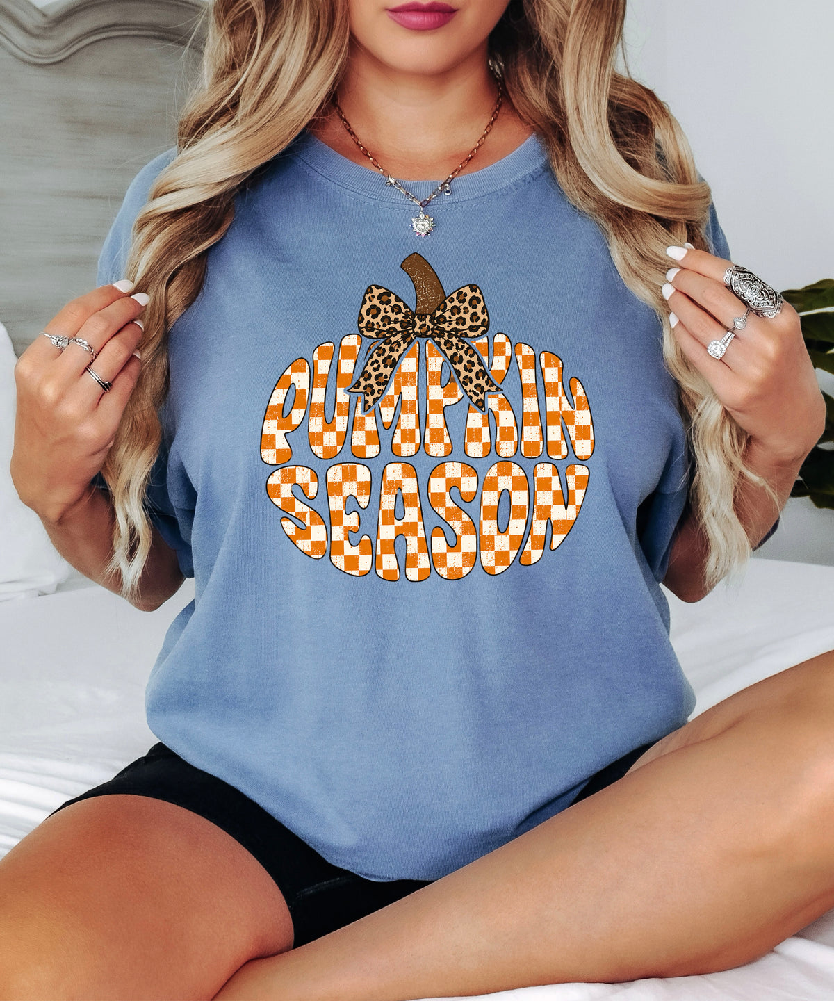 Pumpkin Season checkered pumpkin with leopard bow graphic tee in Blue Jean, Comfort Colors 1717 womens fall t-shirt, back view