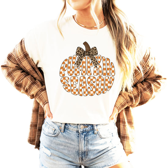 Pumpkin Season checkered pumpkin with leopard bow graphic tee in Ivory, Comfort Colors 1717 womens fall t-shirt, front view