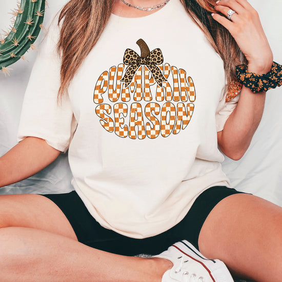 Pumpkin Season checkered pumpkin with leopard bow graphic tee in Ivory, Comfort Colors 1717 womens fall t-shirt, back view