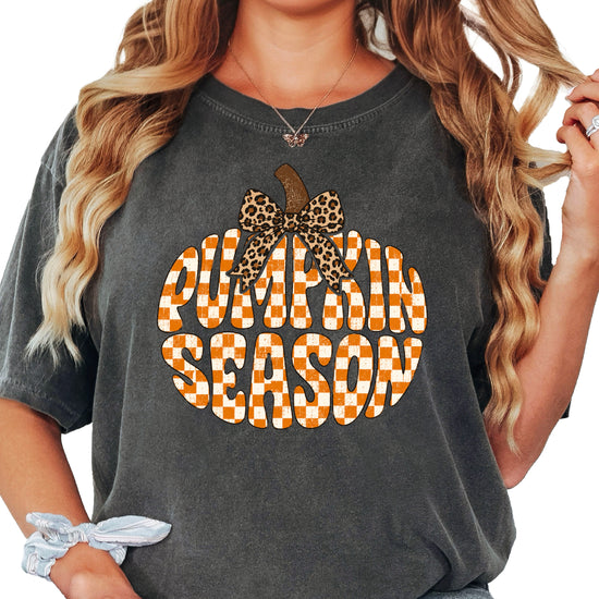 Pumpkin Season checkered pumpkin with leopard bow graphic tee in Pepper, Comfort Colors 1717 womens fall t-shirt, front view