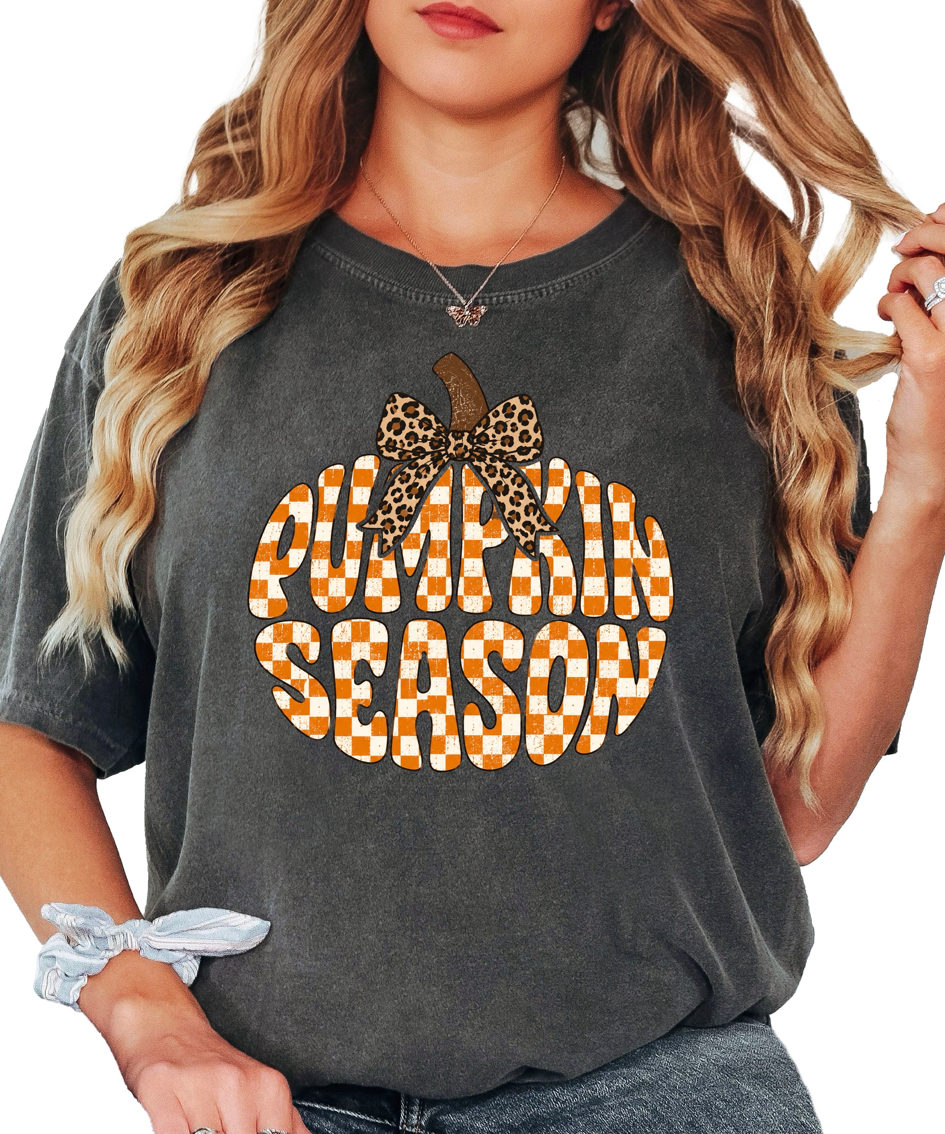Pumpkin Season checkered pumpkin with leopard bow graphic tee in Pepper, Comfort Colors 1717 womens fall t-shirt, front view