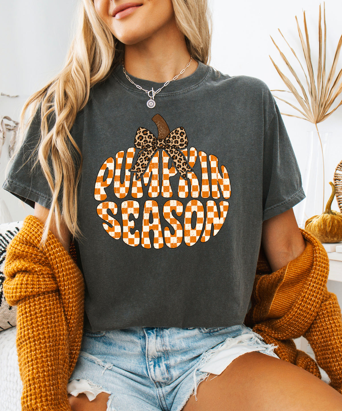 Pumpkin Season checkered pumpkin with leopard bow graphic tee in Pepper, Comfort Colors 1717 womens fall t-shirt, back view