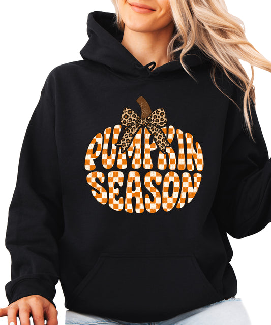 Pumpkin Season retro checkered pumpkin and leopard bow graphic hoodie in Black, front view