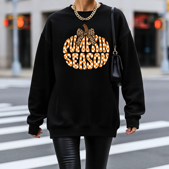 Black Pumpkin Season checkered pumpkin leopard bow crewneck sweatshirt for women, back or flat-lay view