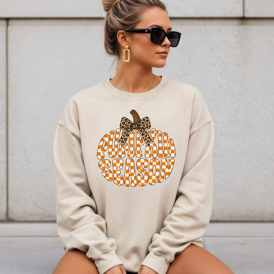 Sand Pumpkin Season checkered pumpkin leopard bow crewneck sweatshirt for women, back or flat-lay view