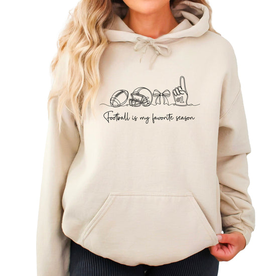 Sand hoodie with Football is My Favorite Season coquette bow graphic, front view