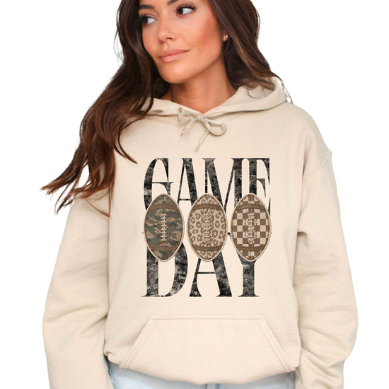 Game Day football hoodie for women in Sand with camo leopard checkered footballs, front view