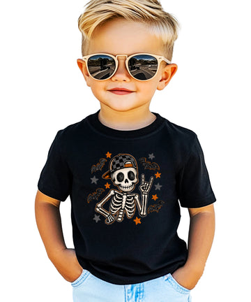Black skeleton Halloween shirt for boys with rock on hand sign and checkered hat, front view
