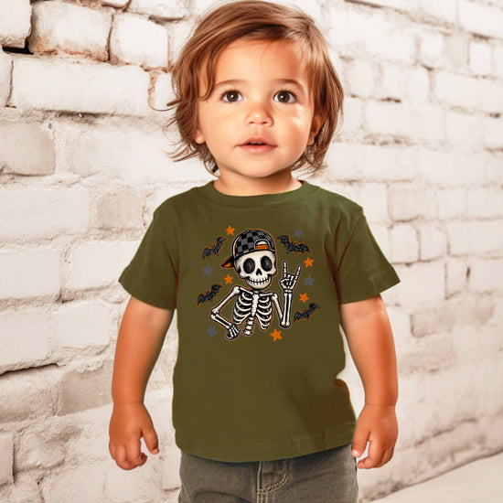 Military green skeleton Halloween boys tee with bats and stars, lifestyle shot