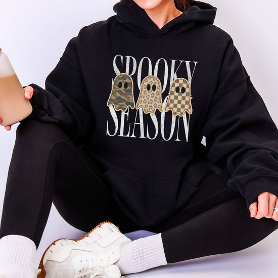 Black hoodie with Spooky Season three ghosts Halloween graphic