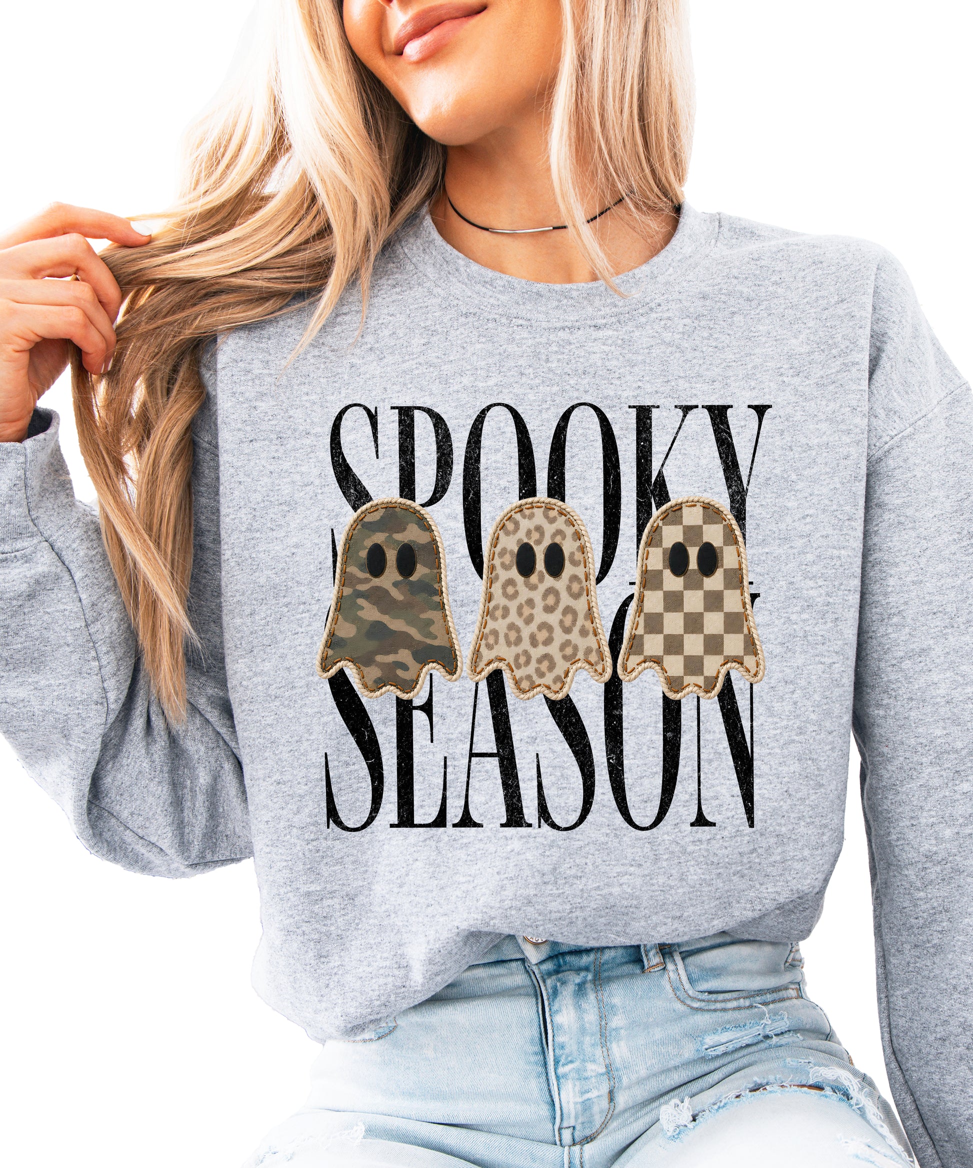 Gray Halloween ghost crewneck sweatshirt, close up of camo leopard checkered ghosts