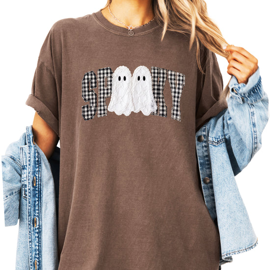 Ink-printed spooky ghost Halloween shirt with arched SPOOKY varsity lettering in black and white gingham and two lace-look ghosts, on an Espresso Comfort Colors 1717 tee, view 1