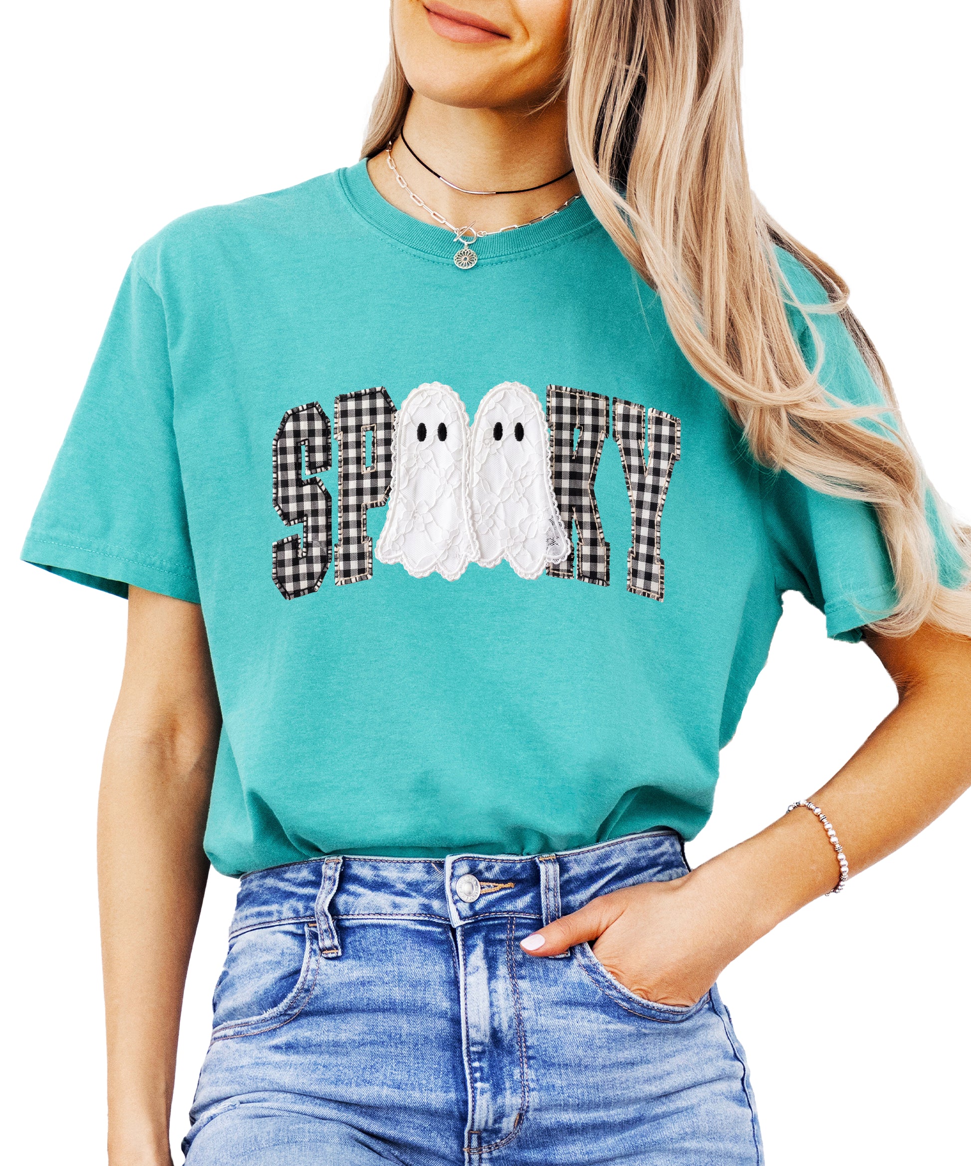 Ink-printed spooky ghost Halloween shirt with arched SPOOKY varsity lettering in black and white gingham and two lace-look ghosts, on a Seafoam Comfort Colors 1717 tee, view 1