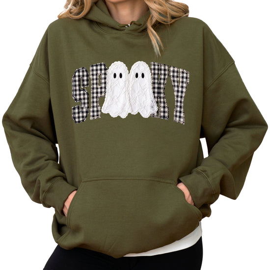 Army green hoodie with ink-printed spooky ghost gingham check graphic, front view